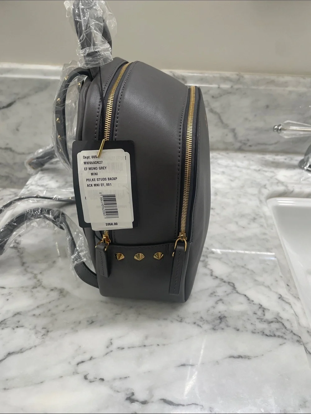 MCM Small Leather Backpack in Dark Gray with Gold Hardware